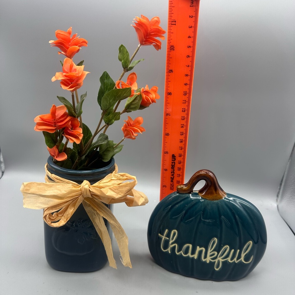 Decorative Orange Flower Arrangement in Blue pint jar and ceramic pumpkin decor
